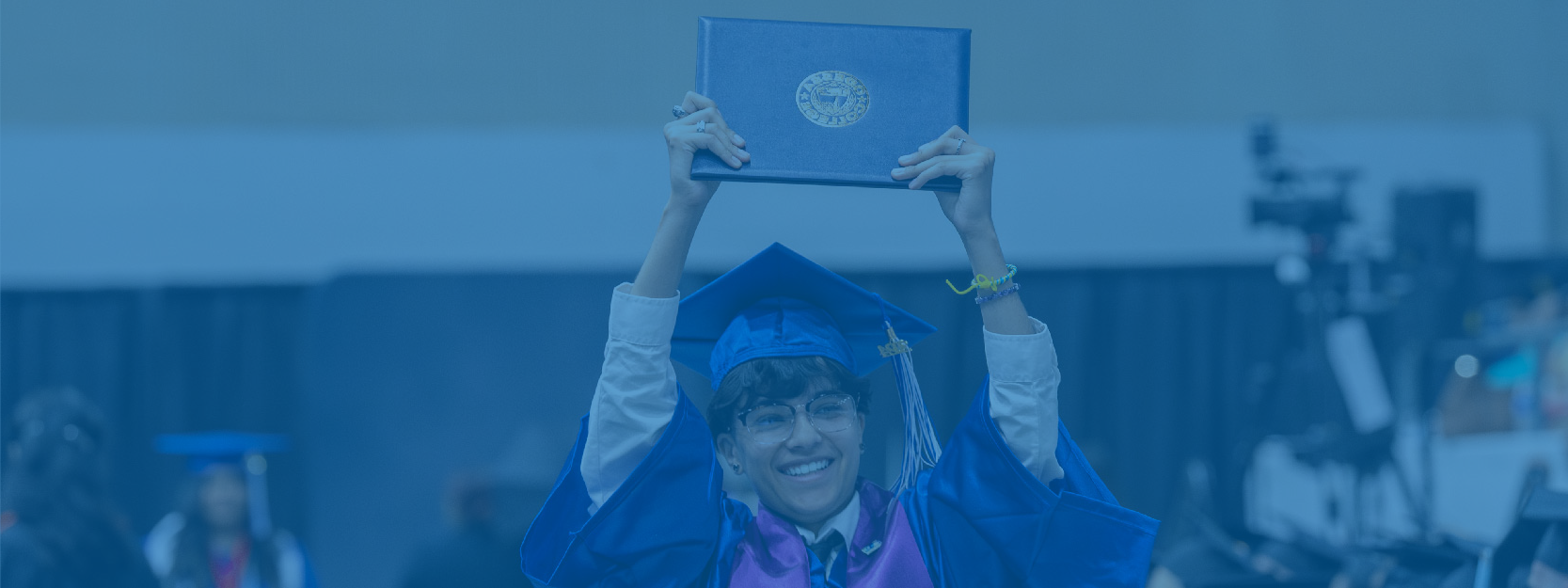 Graduation man with diploma in hands